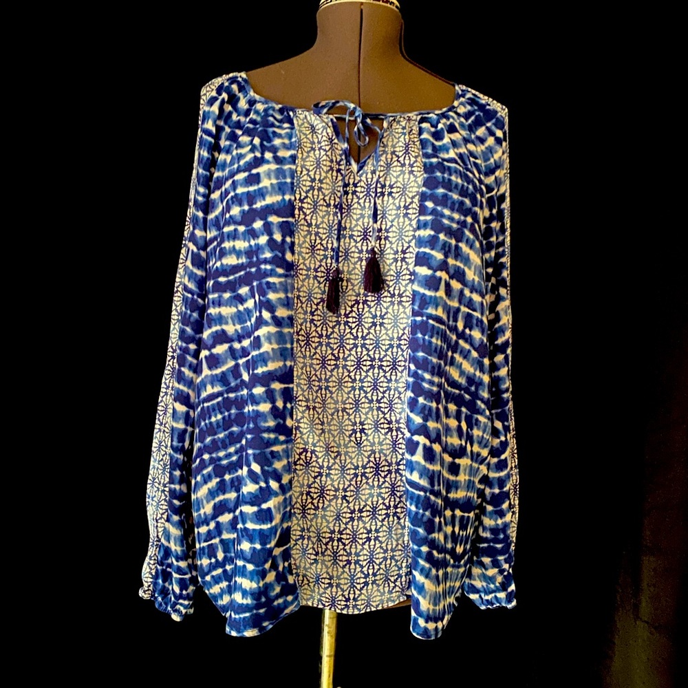 Women’s blue and white tie dye blouse.